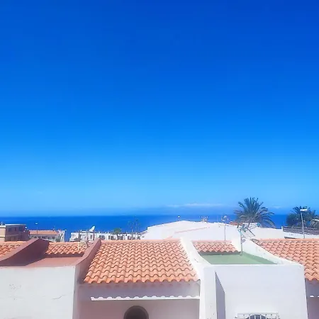בית נופש Agradable Adosado Con Terraza Y Piscina